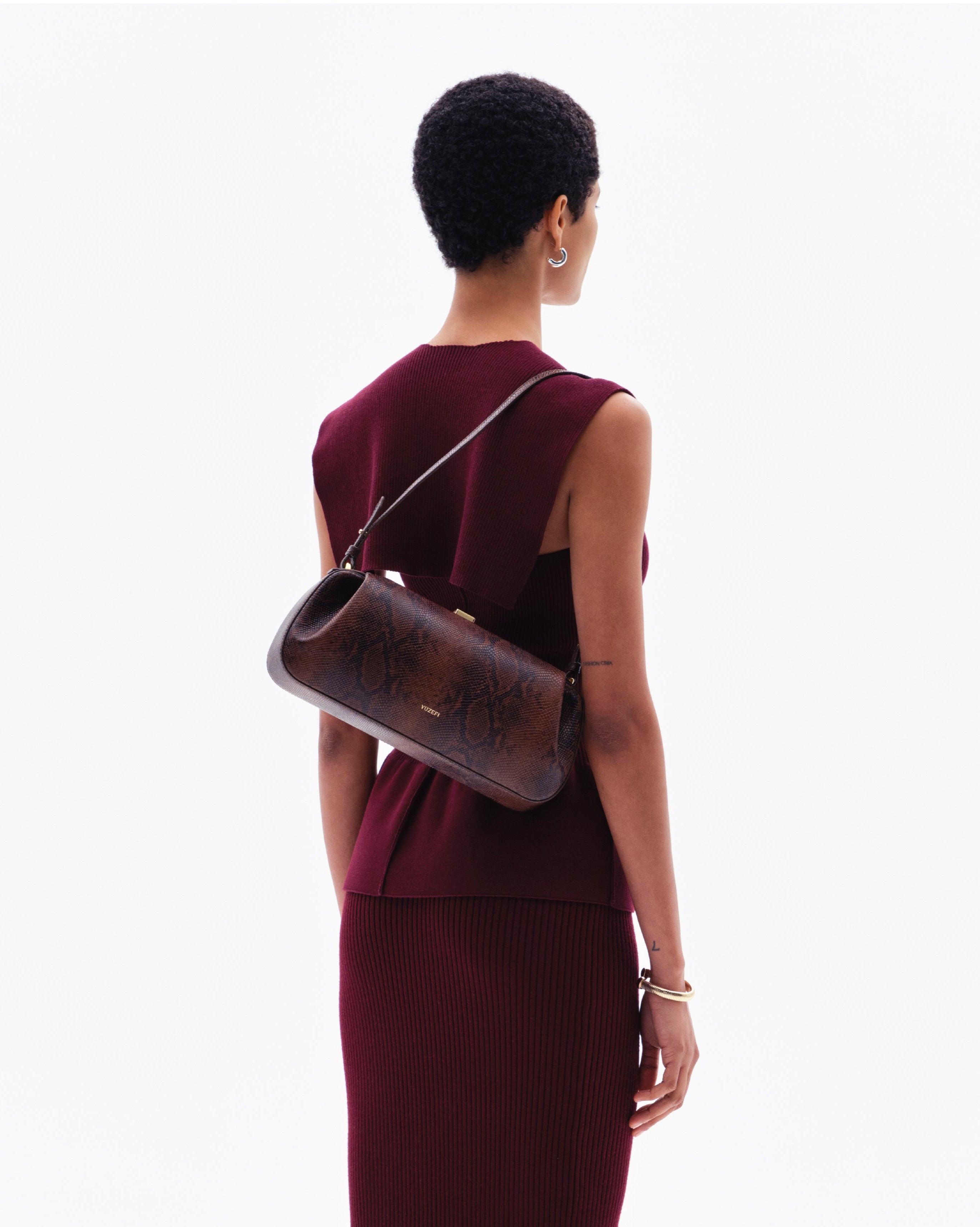 OYSTER CLUTCH - EMBOSSED SNAKE COWHIDE LEATHER