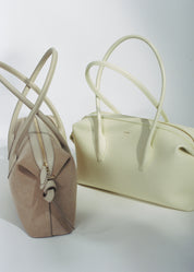 BRIOCHE DUFFLE - SAND SUEDE