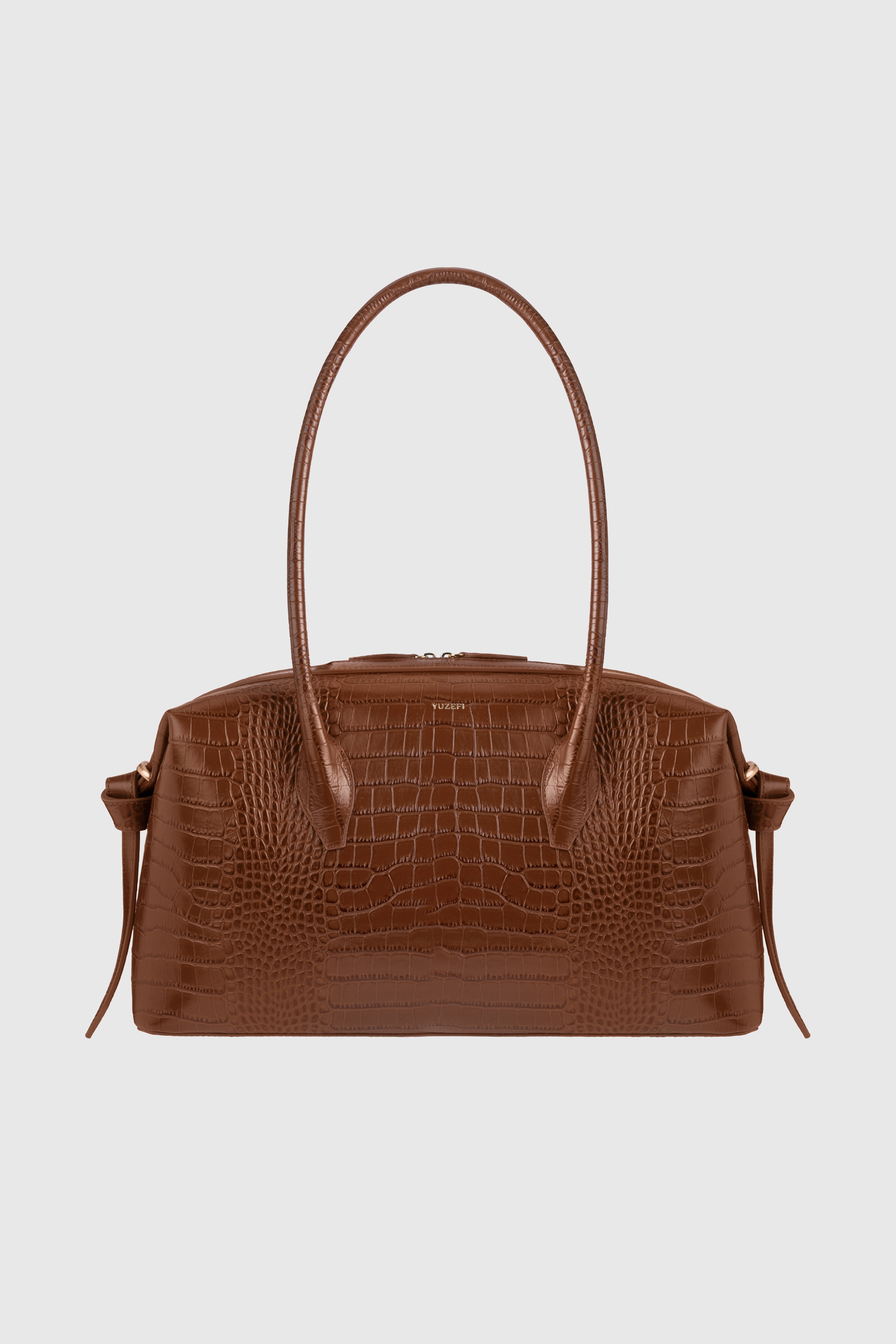 YUZEFI_BRIOCHE_DUFFLE_EMBOSSED_LEATHER_SIERRA_1.jpg